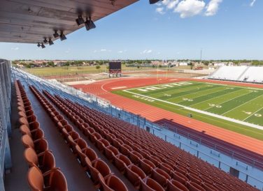 view from bleachers of field at Hutto ISD Memorial Stadium in Hutto, TX